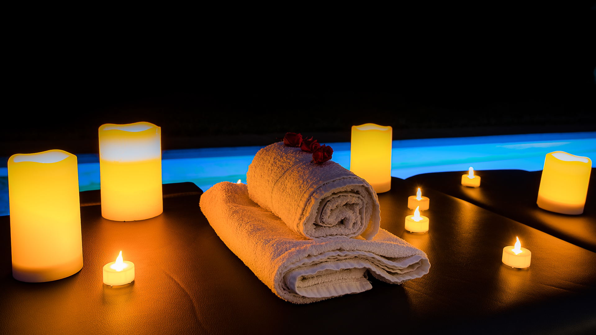 Détail table de massage avec bougies